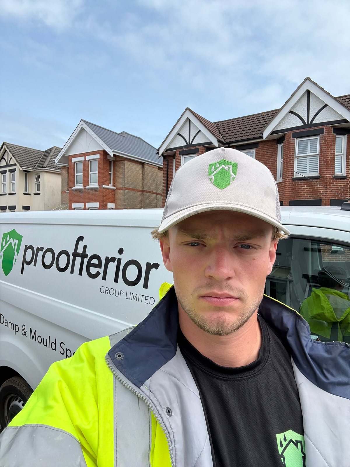 Proofterior surveyor beside a branded van in Wiltshire
